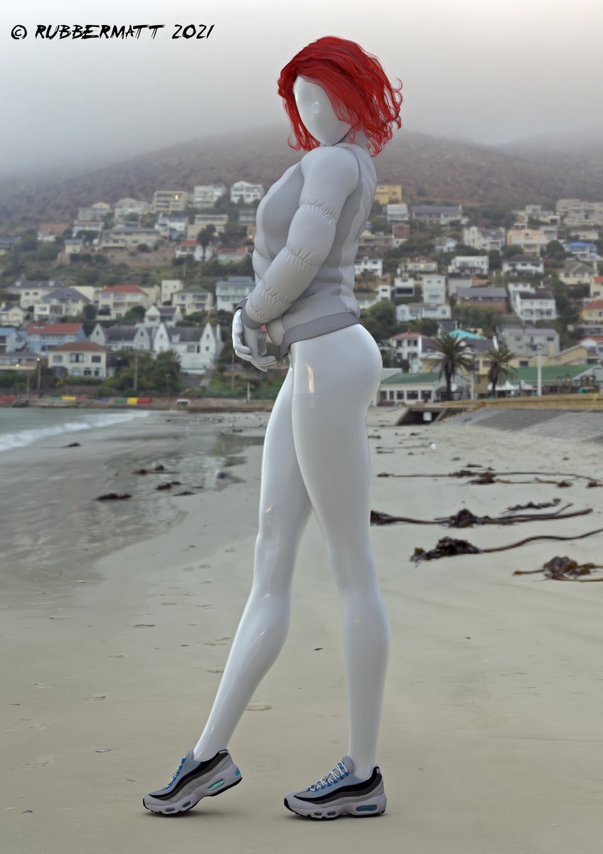 Redhead with a jacket at the beach